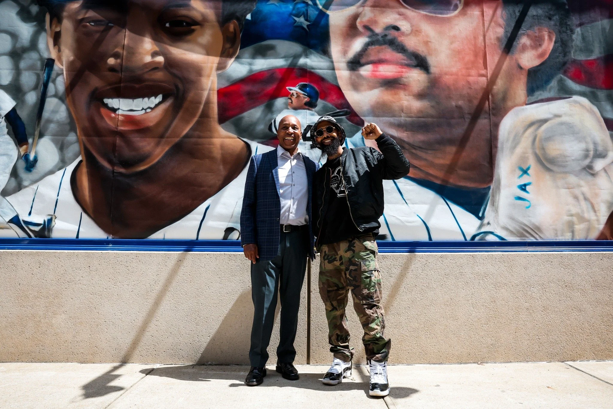 Willie Randolph and Artist Andre Trenier in Front of Mural