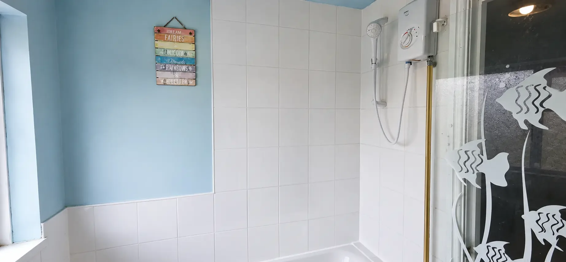 Modern bathroom wall tiling installation in Newquay