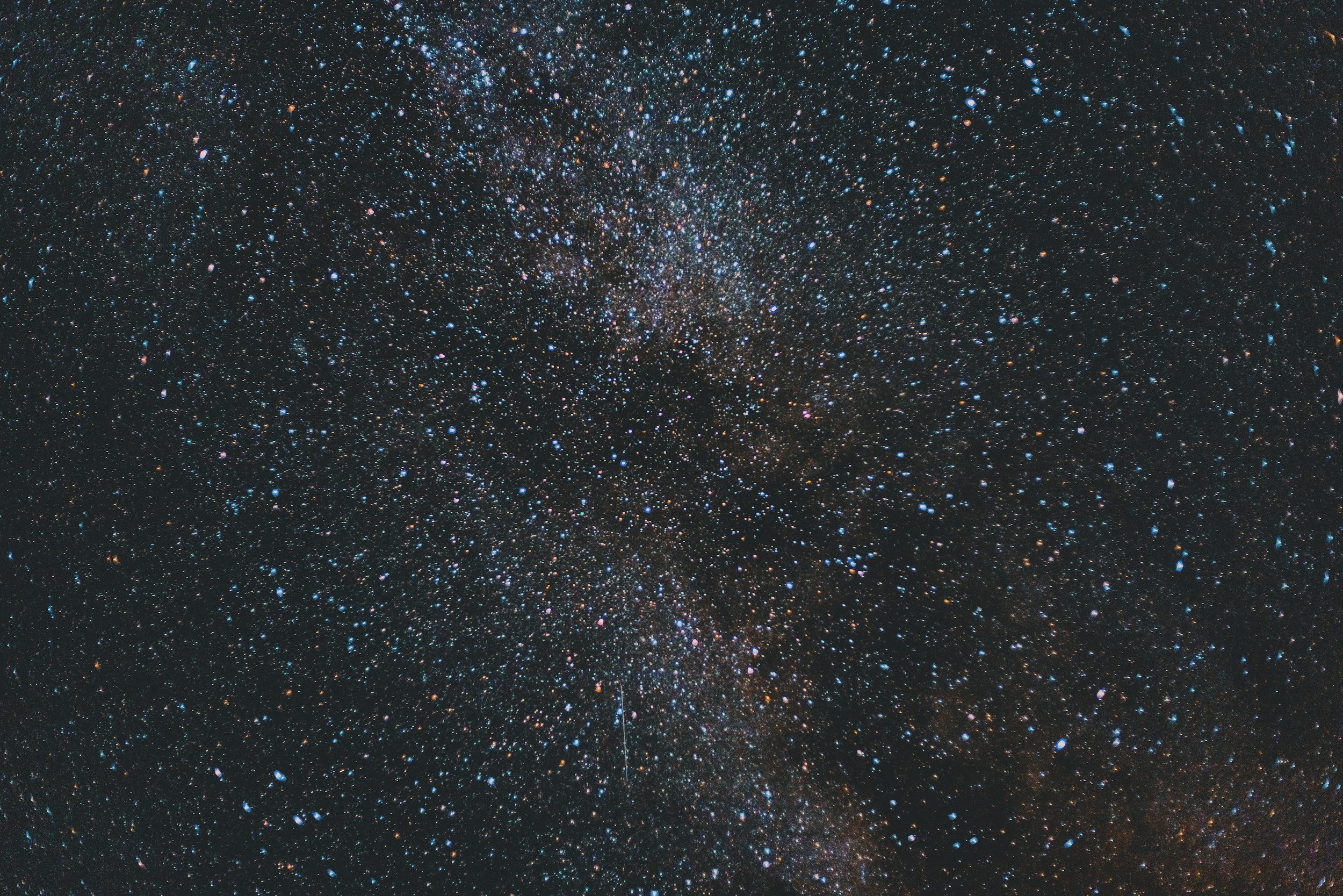 A view of the dense and colorful stars and galaxies in the universe, creating a stunning cosmic scene.