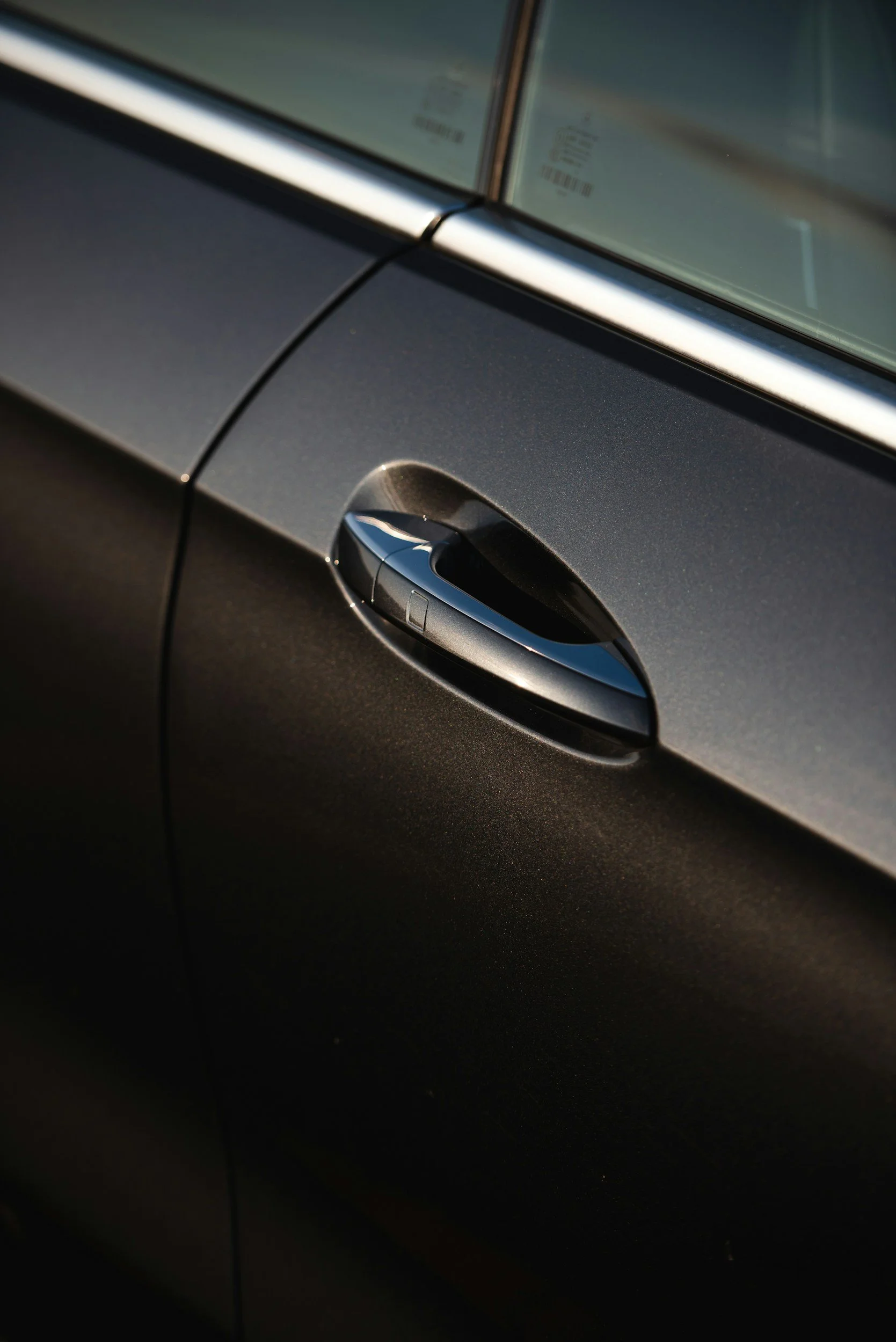 Minor dent removal on grey vehicle door in Kent