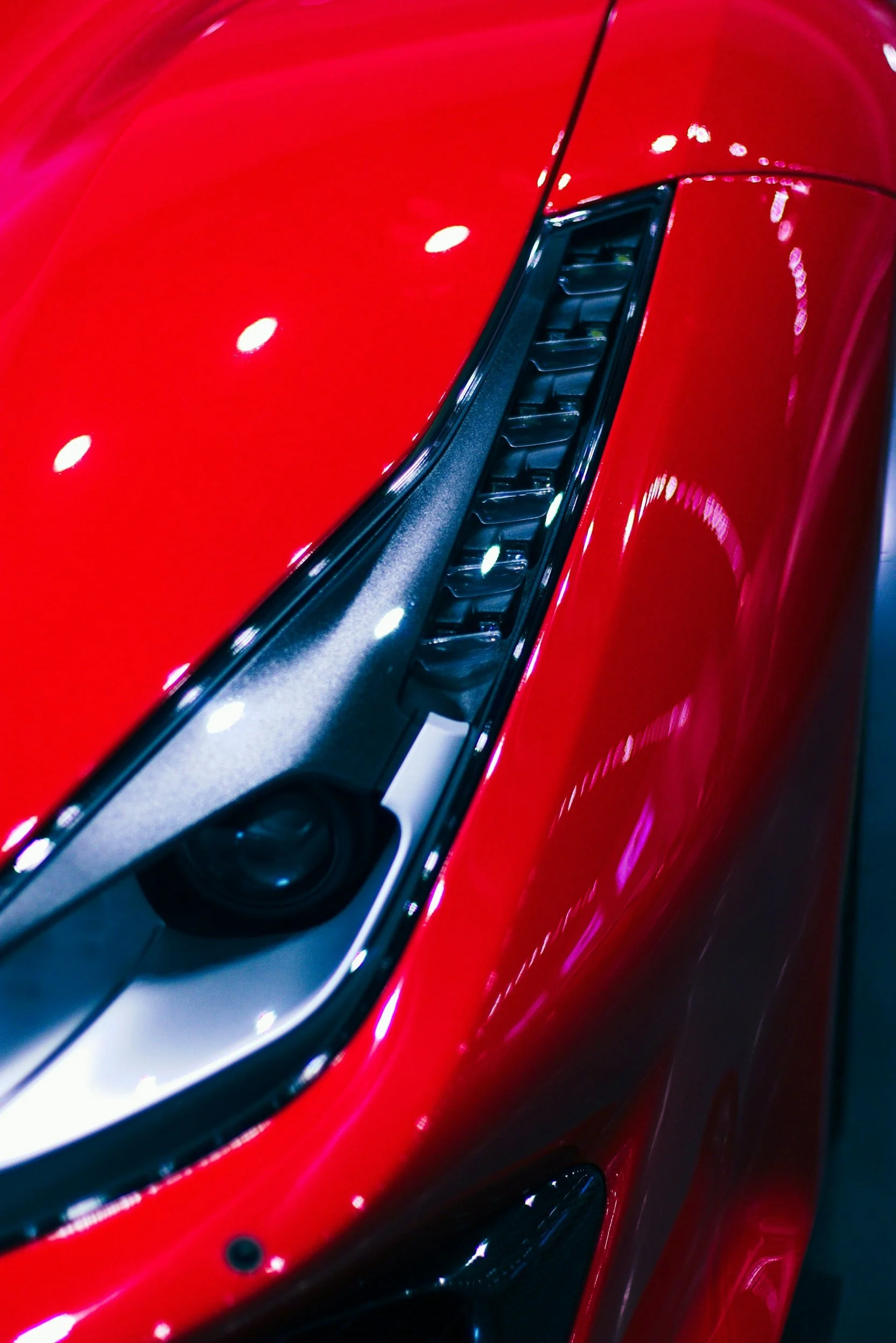 Deep gloss paint correction on red sports car Thanet