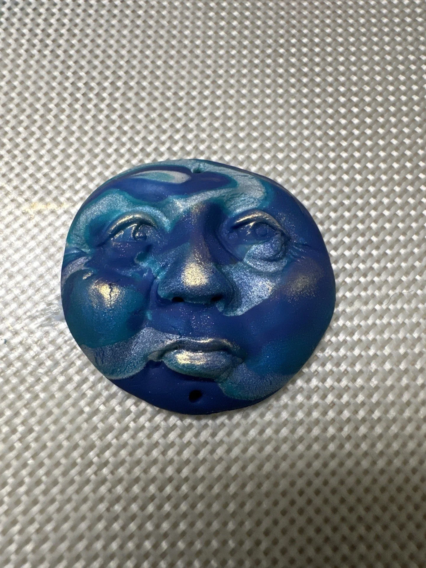 Blue Moon sculpted clay piece