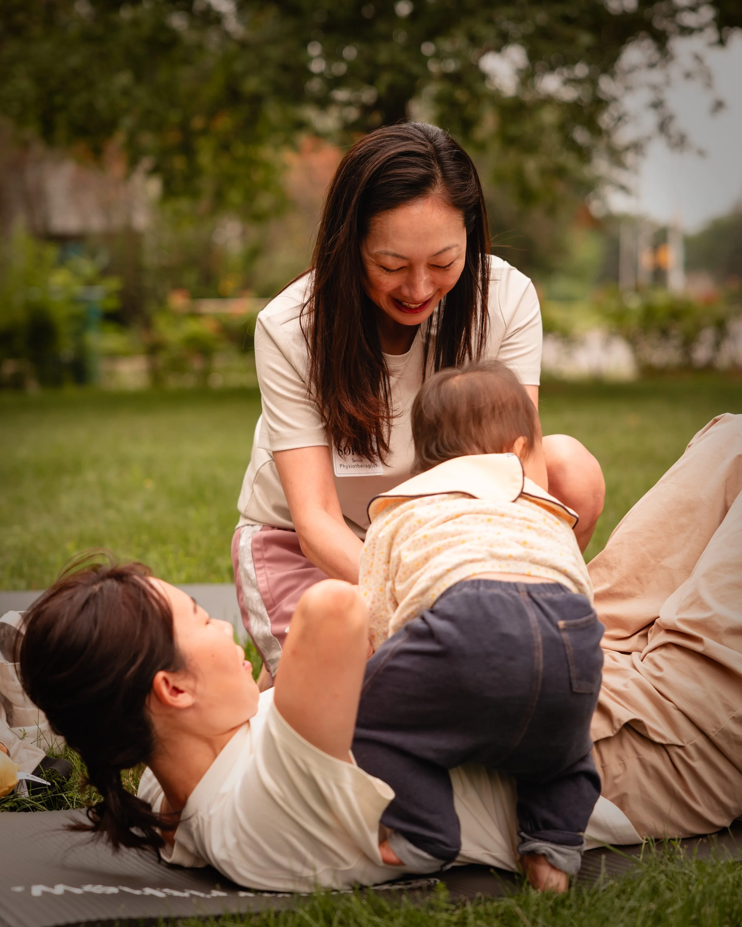 physiotherapist-supporting-baby-development-the-nest-stittsville.jpg