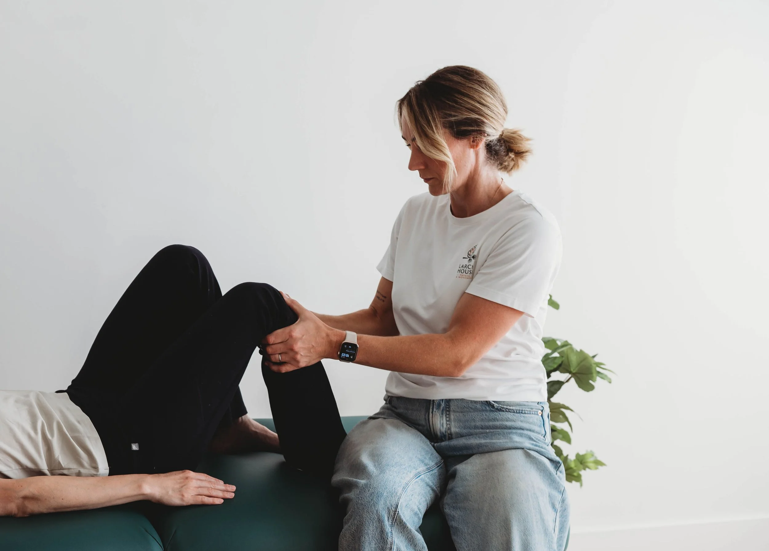 Physiotherapist providing hands-on treatment during a physiotherapy session at Larch House Physio & Movement in Stittsville.