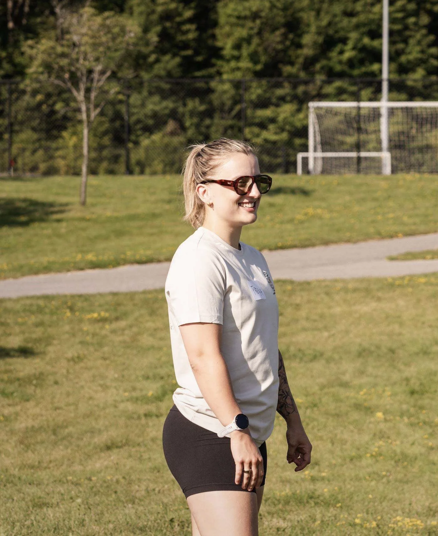 Freya Moosbrugger coaching at an outdoor Larch House Physio & Movement community fitness event in Stittsville.