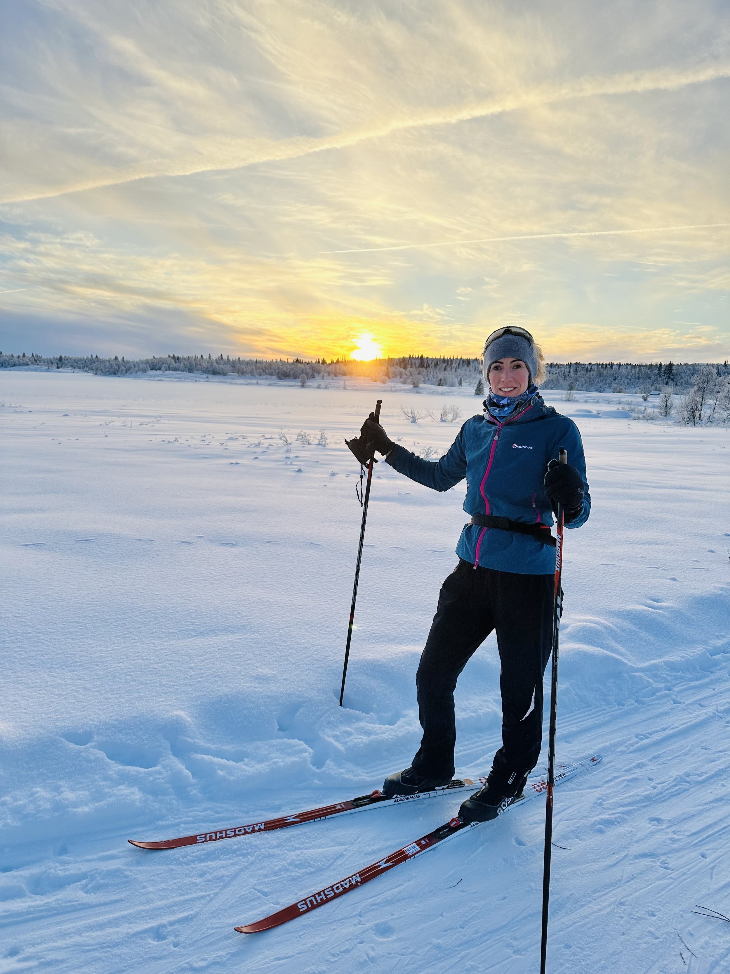 Sally Lygo cross-country skiing, reflecting her active lifestyle and love of outdoor sport.