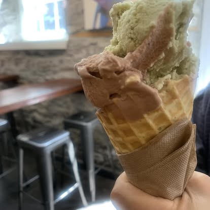 Ice cream cone with two scoops, shared by Sophia Park McKenna on her bio page.