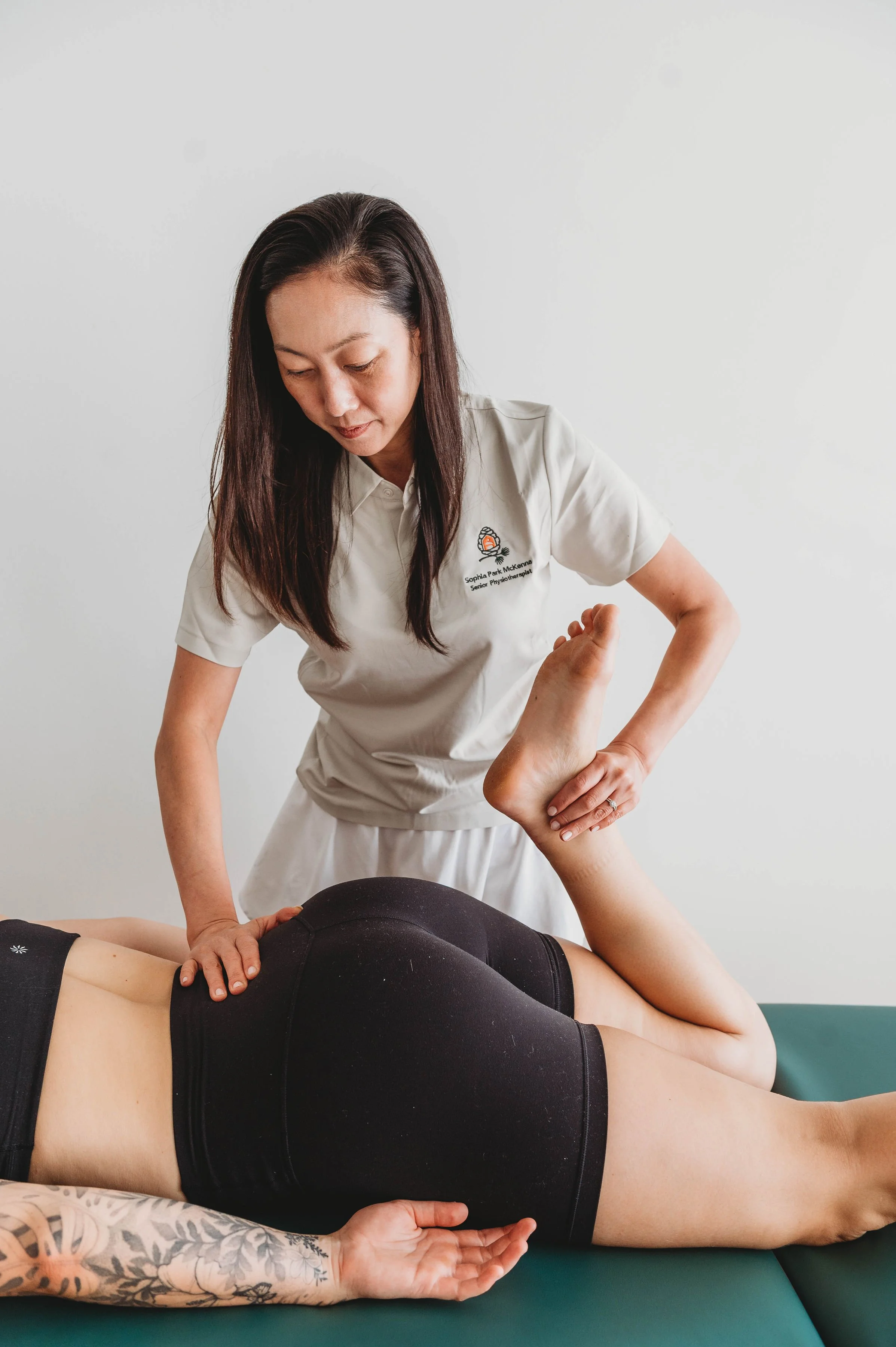 Physiotherapist providing hands-on treatment and mobility therapy for the hip and lower back at Larch House Physio & Movement in Stittsville.