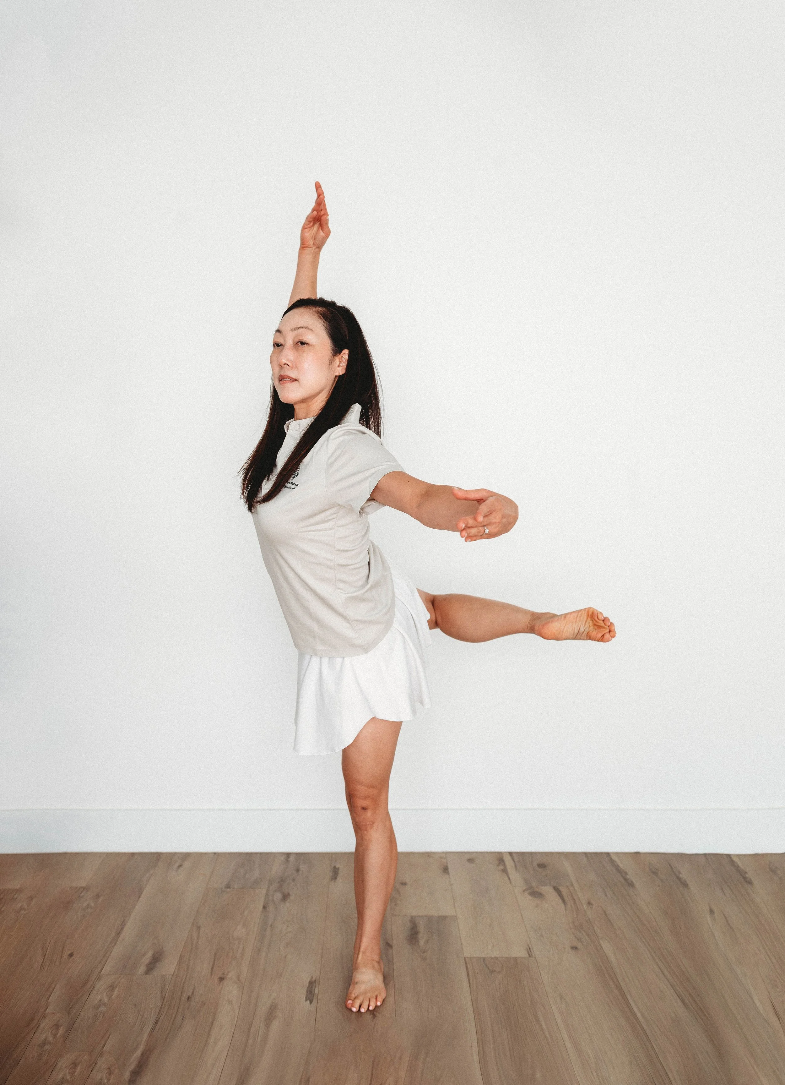Sophia Park McKenna, Senior Physiotherapist and former dancer, demonstrating a ballet-inspired movement and balance exercise.