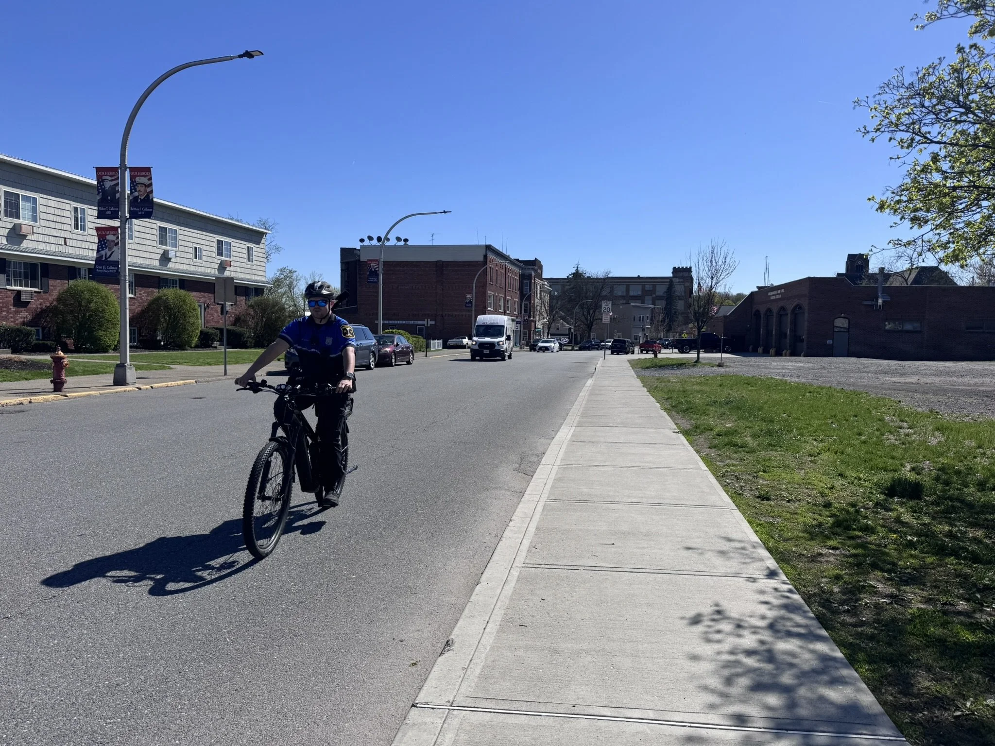 A photo of a police officer on a bike in Mechanicville.