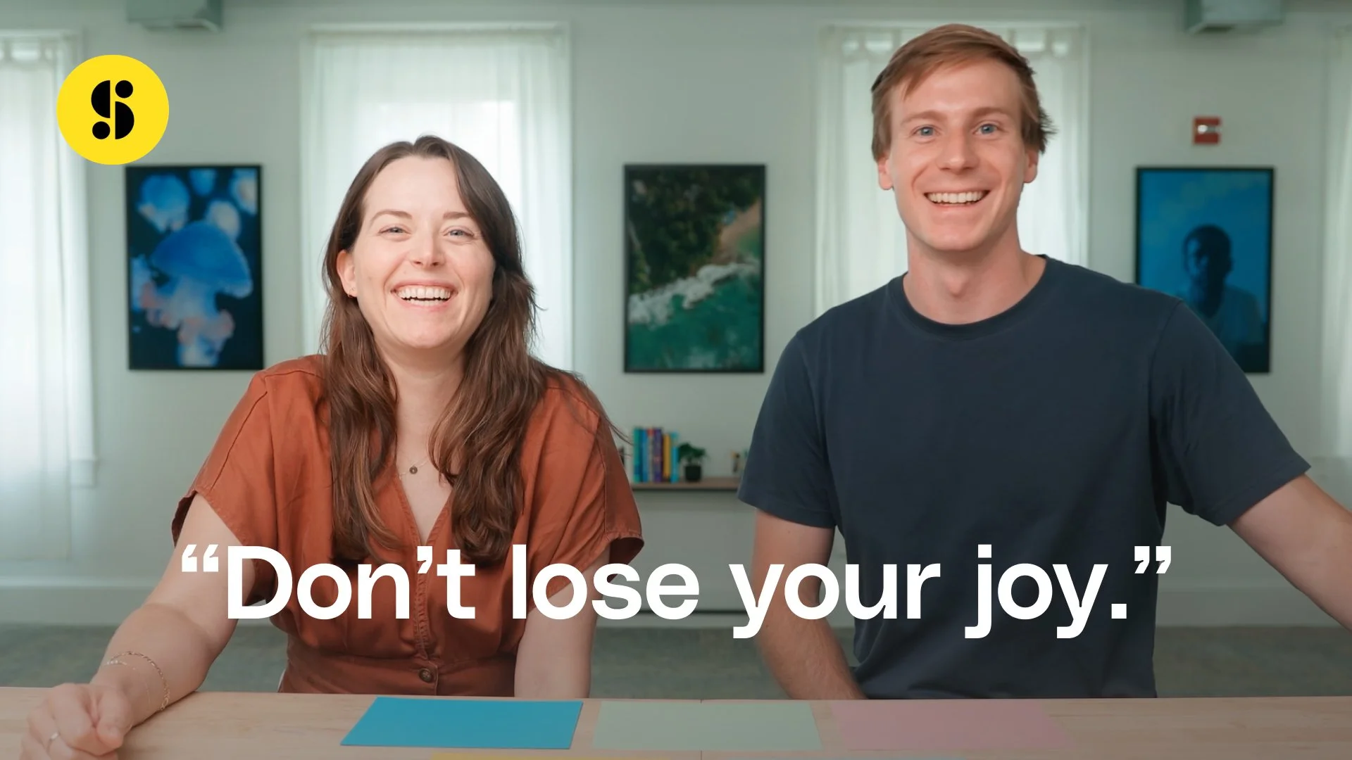 Kaitlyn and Kyle smile on set of a YouTube video with a caption that says "Don't lose your joy."