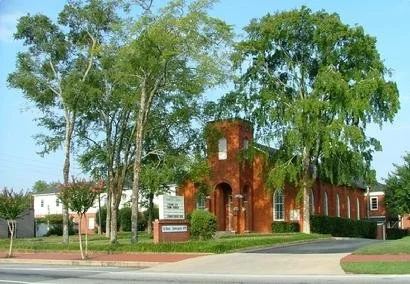 40.250 sq. ft. Historic Church Campus converted to Woodstock City Chambers on 3.5 acres in Downtown Woodstock.  
