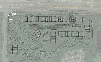 10.23 acres within City of Woodstock zoned and approved for 48 townhome lots.  