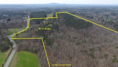 47.9 acres located on Mountain Road in Woodstock, GA.  Zoned R40.  