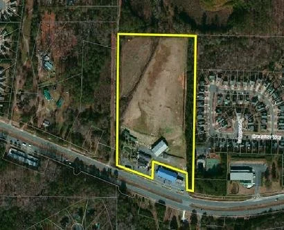 15.28 acres fronting Hwy 92 in Woodstock at Clover Creek.  A golf driving range for 30+ years, the site is being redeveloped for 40 residential lots and commercial at the Hwy 92 frontage.  