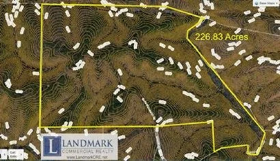 226.83 acres atop Garland Mountain in Waleska, GA.  This site to be developed into Garland Mountain Sporting Clays shooting facility and lodge...a premier destination in Cherokee County.  Bank owned asset. 