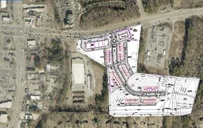 18.5 acres at Highway 92 near Main Street  in Woodstock, GA entitled for 20,000 sq. ft. of commercial space and 55 single family attached lots.  