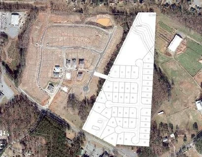 19 acres located on Bascomb Carmel Road zoned for 43 detached active adult homes.  This parcel represents phase 2 of the "Heritage at Towne Lake" subdivision. 