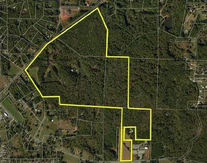 5 parcel assemblage of 128 acres fronting both North Arnold Mill Road and Arnold Mill Road in Woodstock, GA.  LDP permit for 115 lot conservation community.  