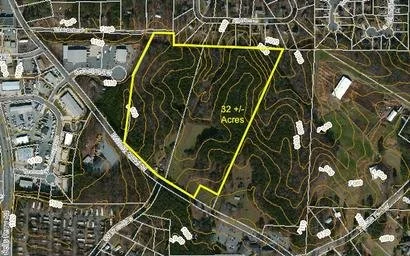 32.95 acres fronting Bascomb Carmel Road in Woodstock, GA. 