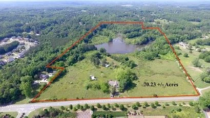 70.25 acres on Arnold Mill Road just moments from downtown Woodstock land planned for a 57 lot conservation subdivision.  