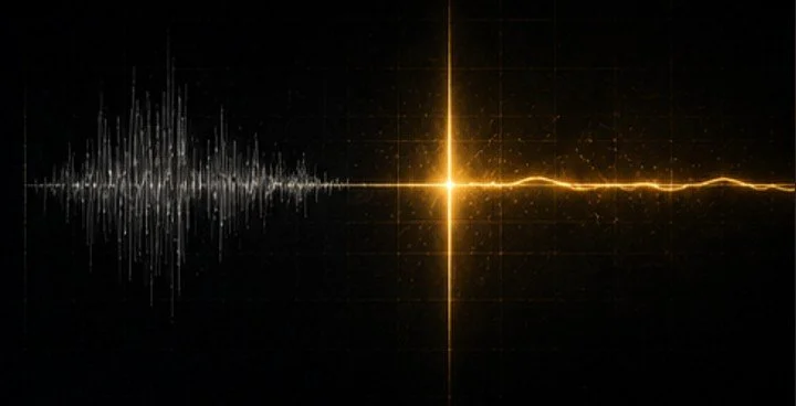 A digital visualization of sound waves with a bright central point and waveform patterns on both sides, set against a black background.