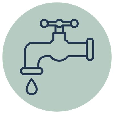Water faucet with a drop of water falling from it.