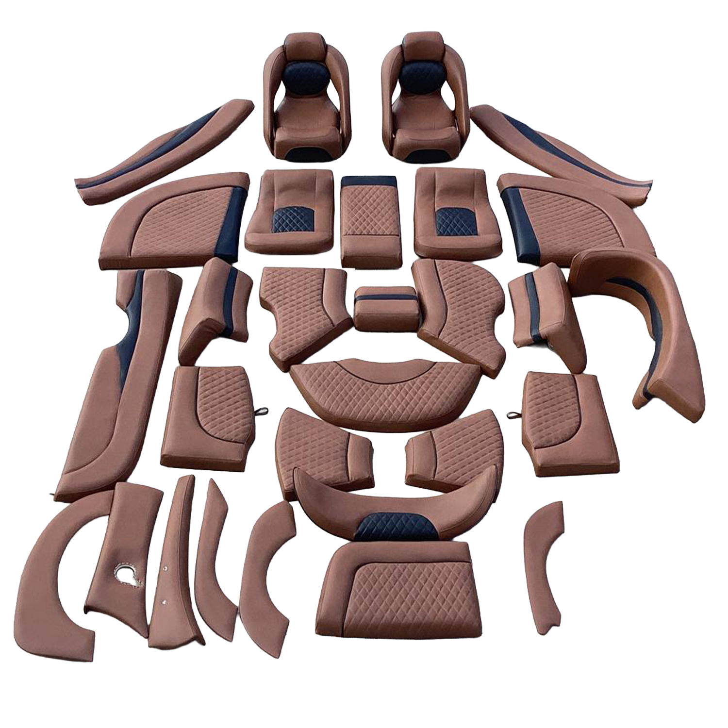 Set of brown and black car seat cushions and interior components arranged for assembly or display.