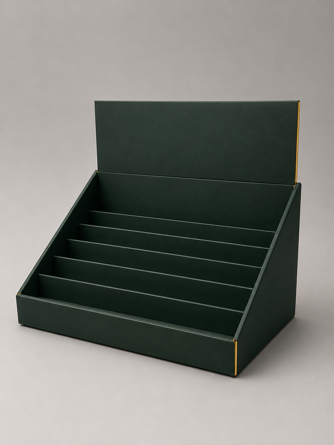 Dark green display box with multiple compartments for organizing items, with a slightly tilted front for visibility.