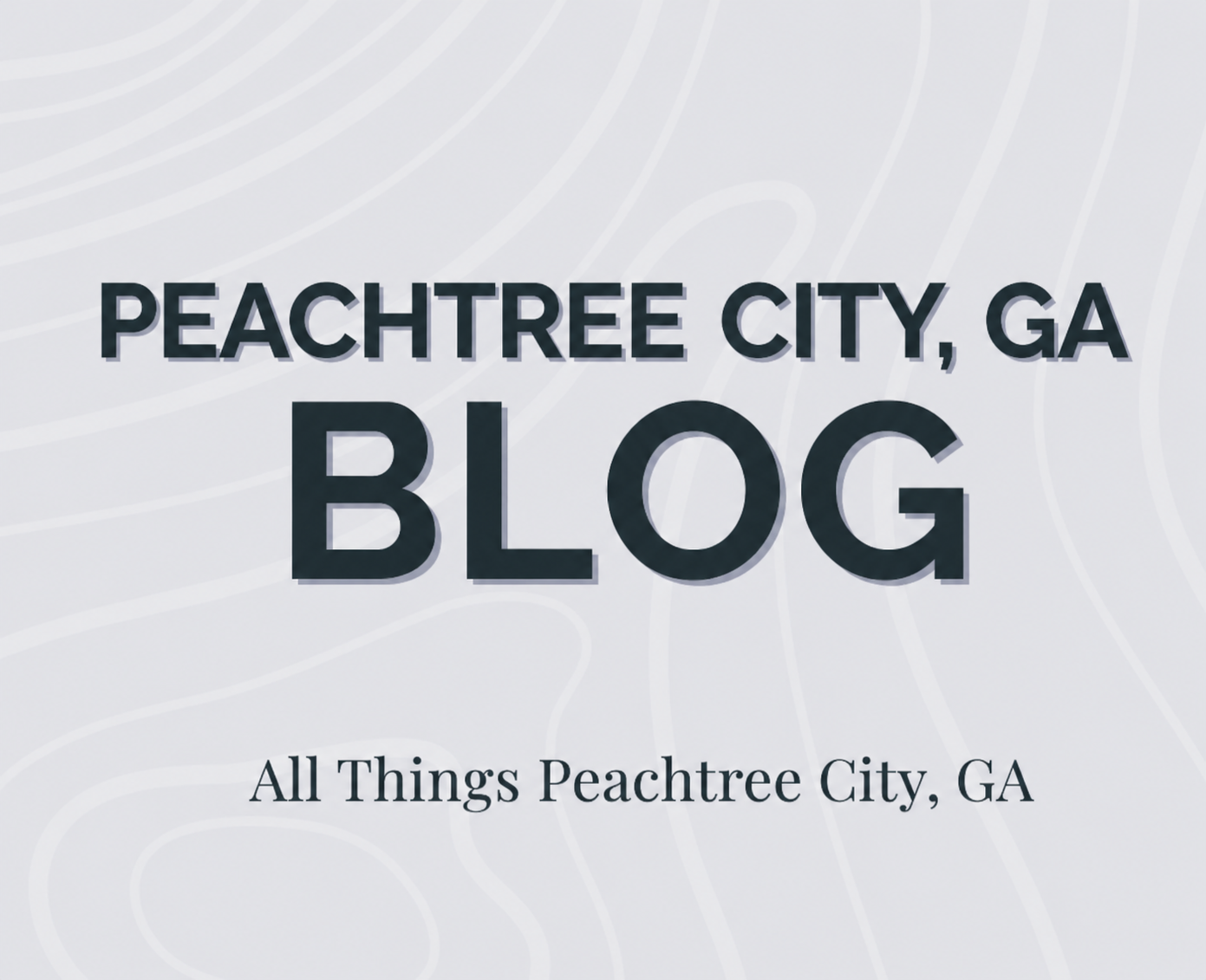 A graphic with the text 'Peachtree City, GA Blog' and 'All Things Peachtree City, GA' in a stylized font on a light, abstract background.