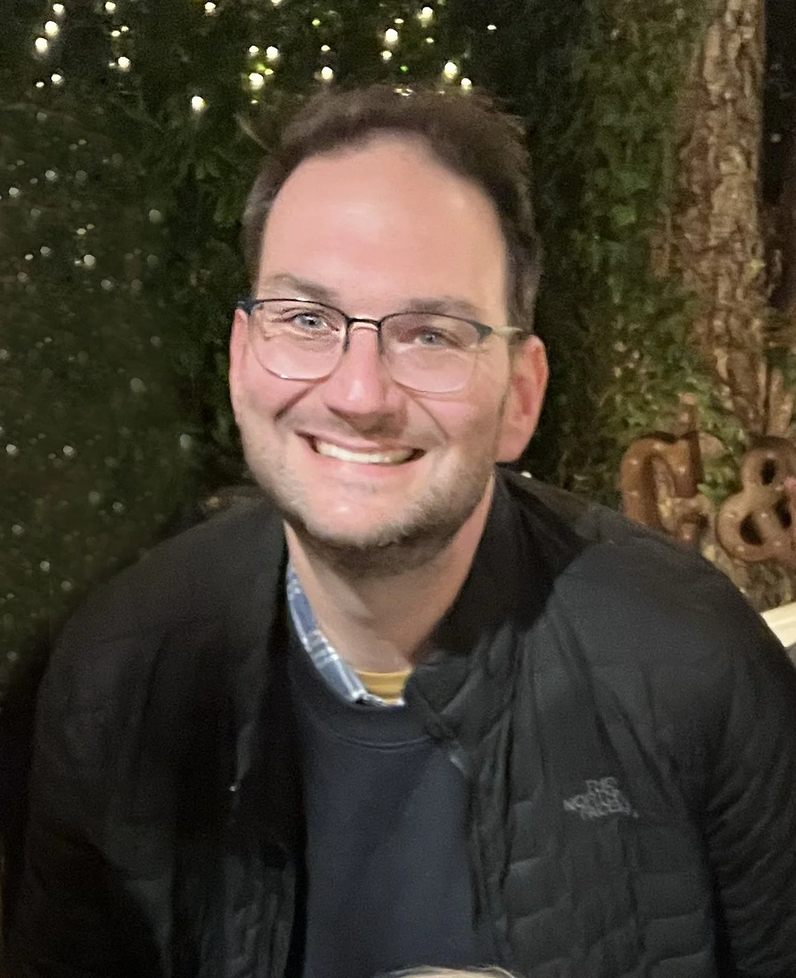 Happy customer of Jess Regan Creative Arts, a male with brown hair and glasses