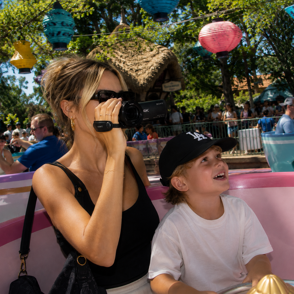 mom and son at Disney using film yours camcorder rental