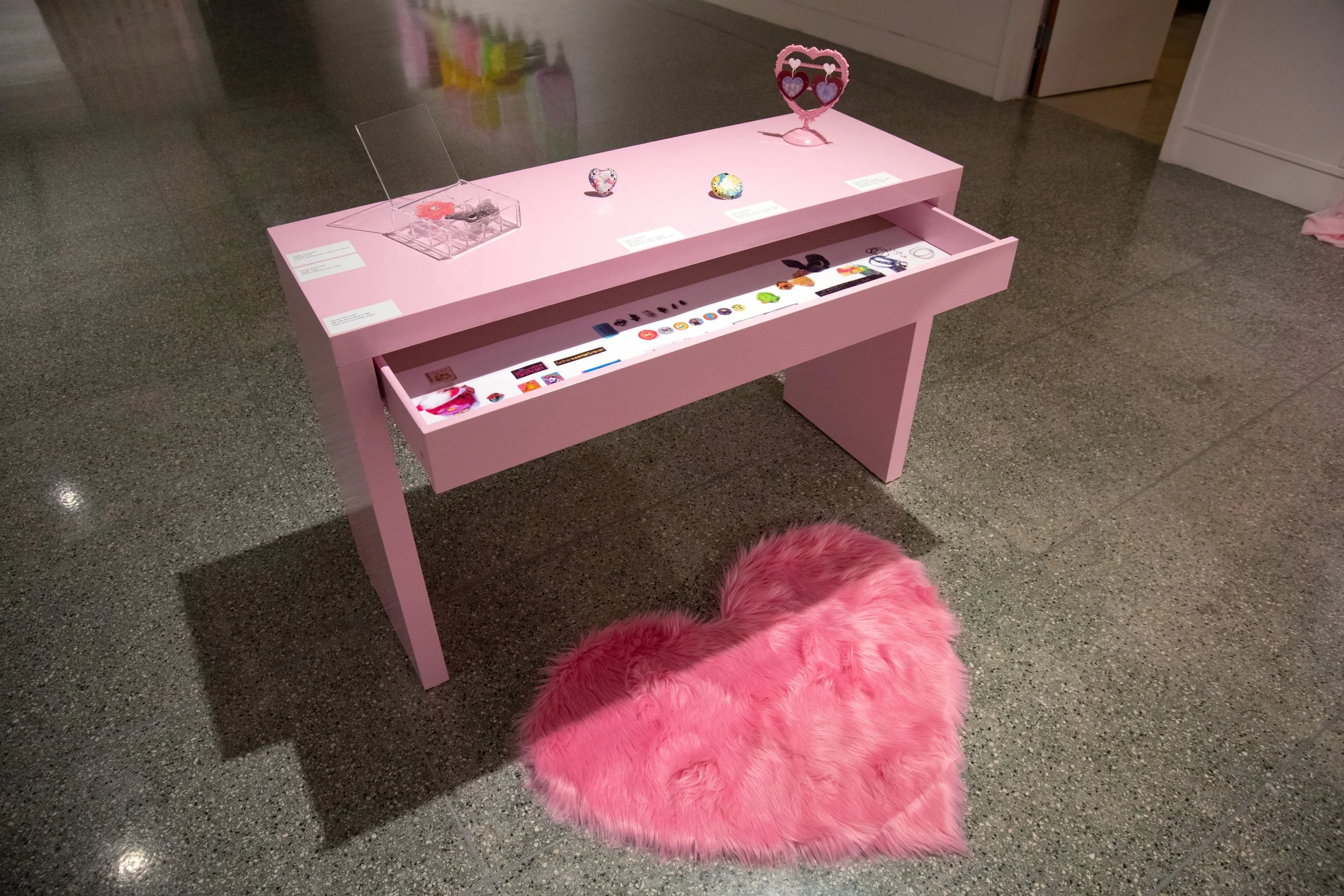 pink desk art jewelry installation