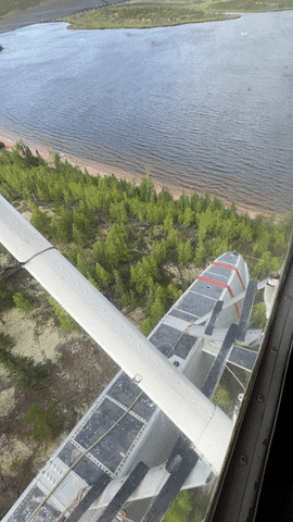 View from the air of land and lake in Manitoba