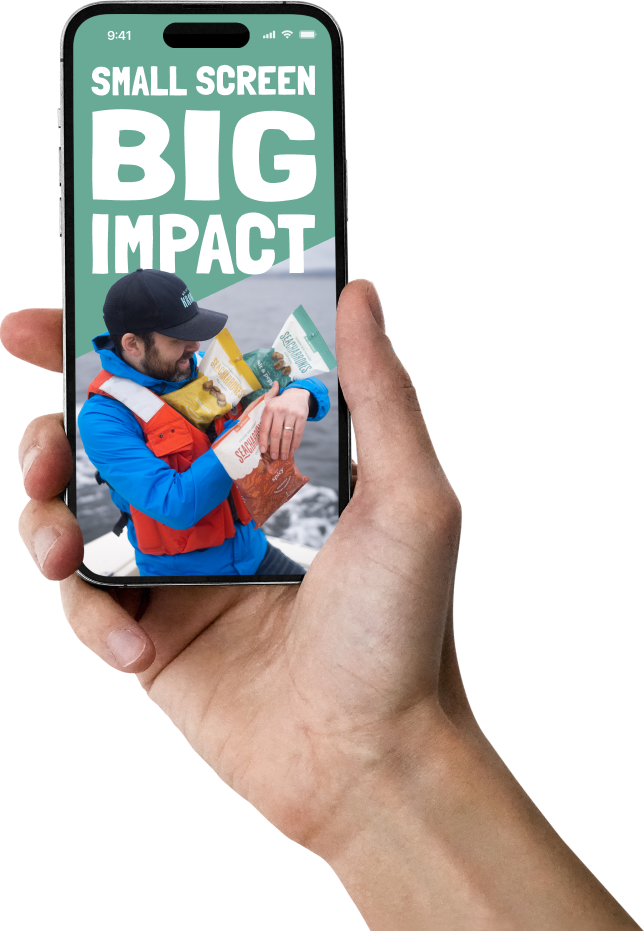 A hand holding a smartphone showing a man in outdoor gear holding multiple snack packages, with large text that reads 'Small Screen Big Impact' over a mountain landscape background.