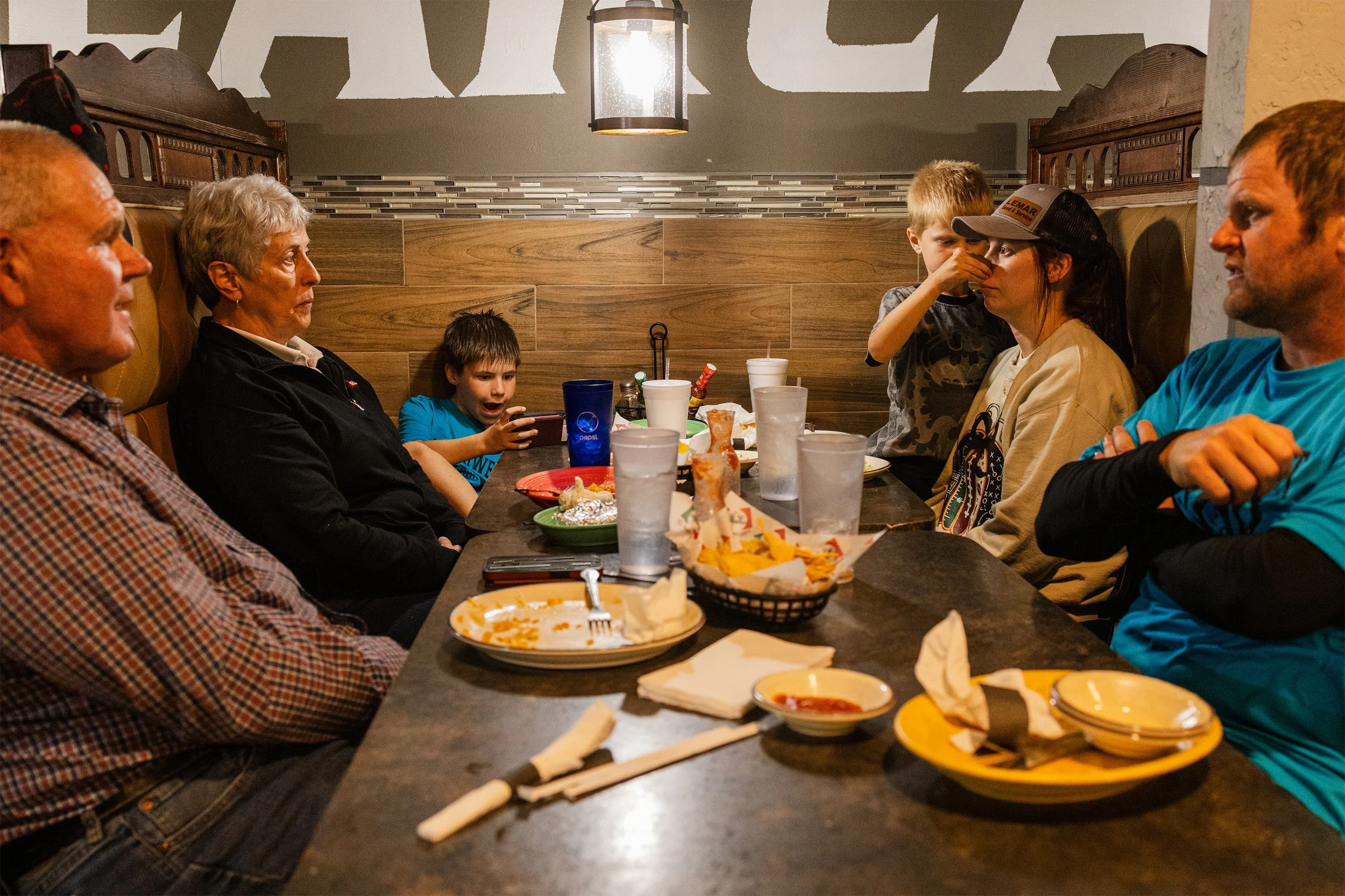 Three generations of Millers have dinner at El Maguey in Maryville. Before dinner, the entire family was at Madden Miller’s flag football game. They try to eat meals together whenever possible after sporting events, involving Madden and his younger b