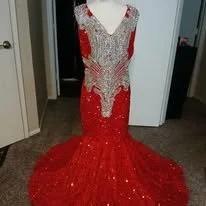Granddaughter sparkly red prom dress.jpg