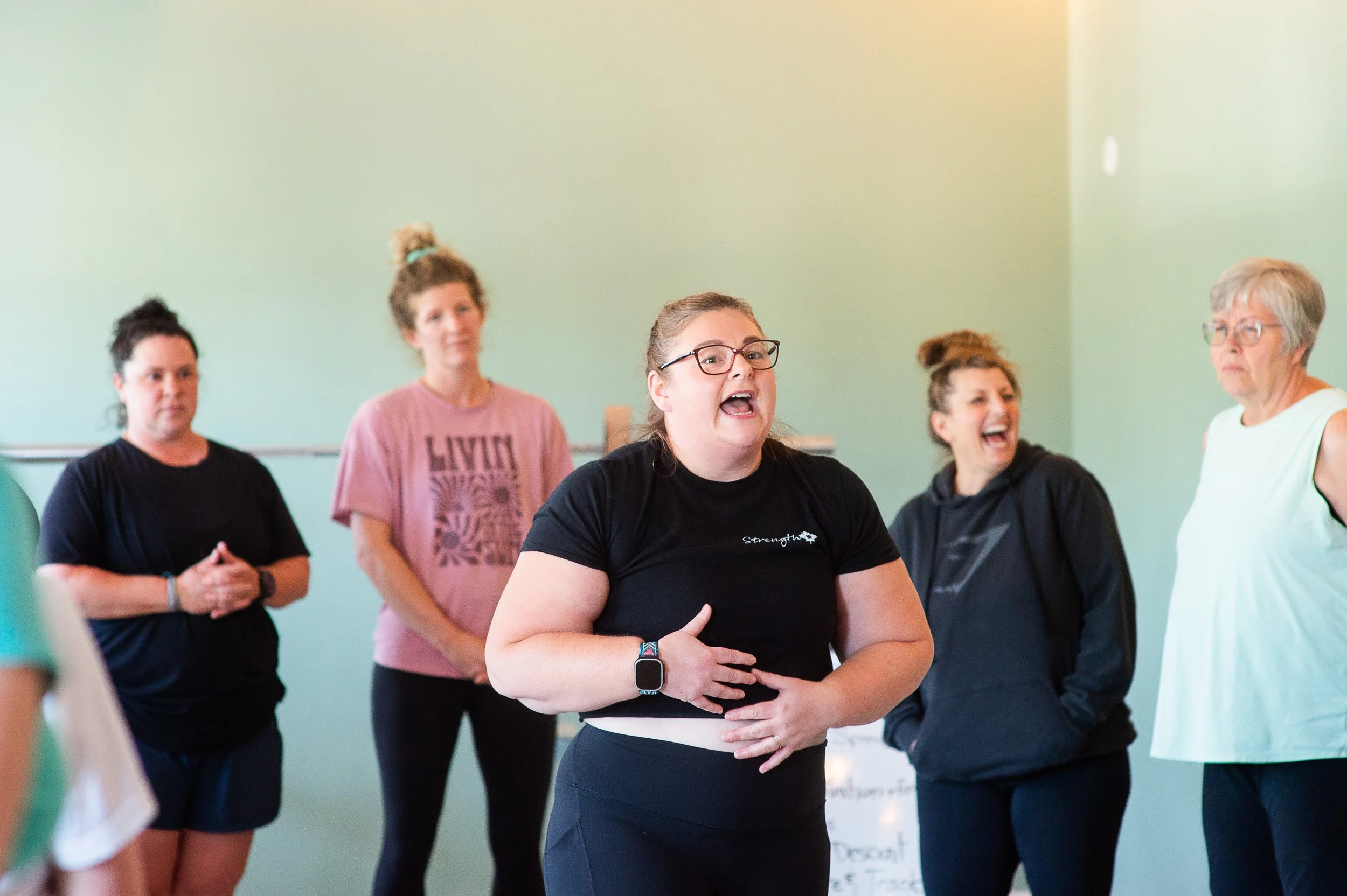 Laura talking to a group of women