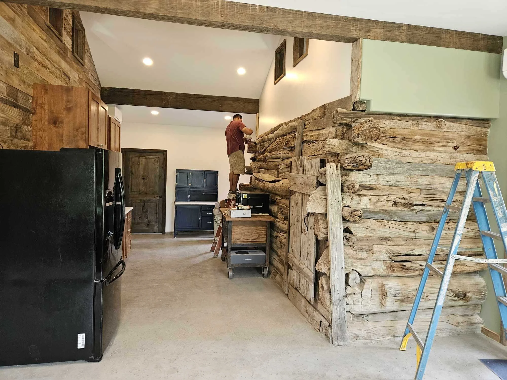 rebuilt log home integrated to new space