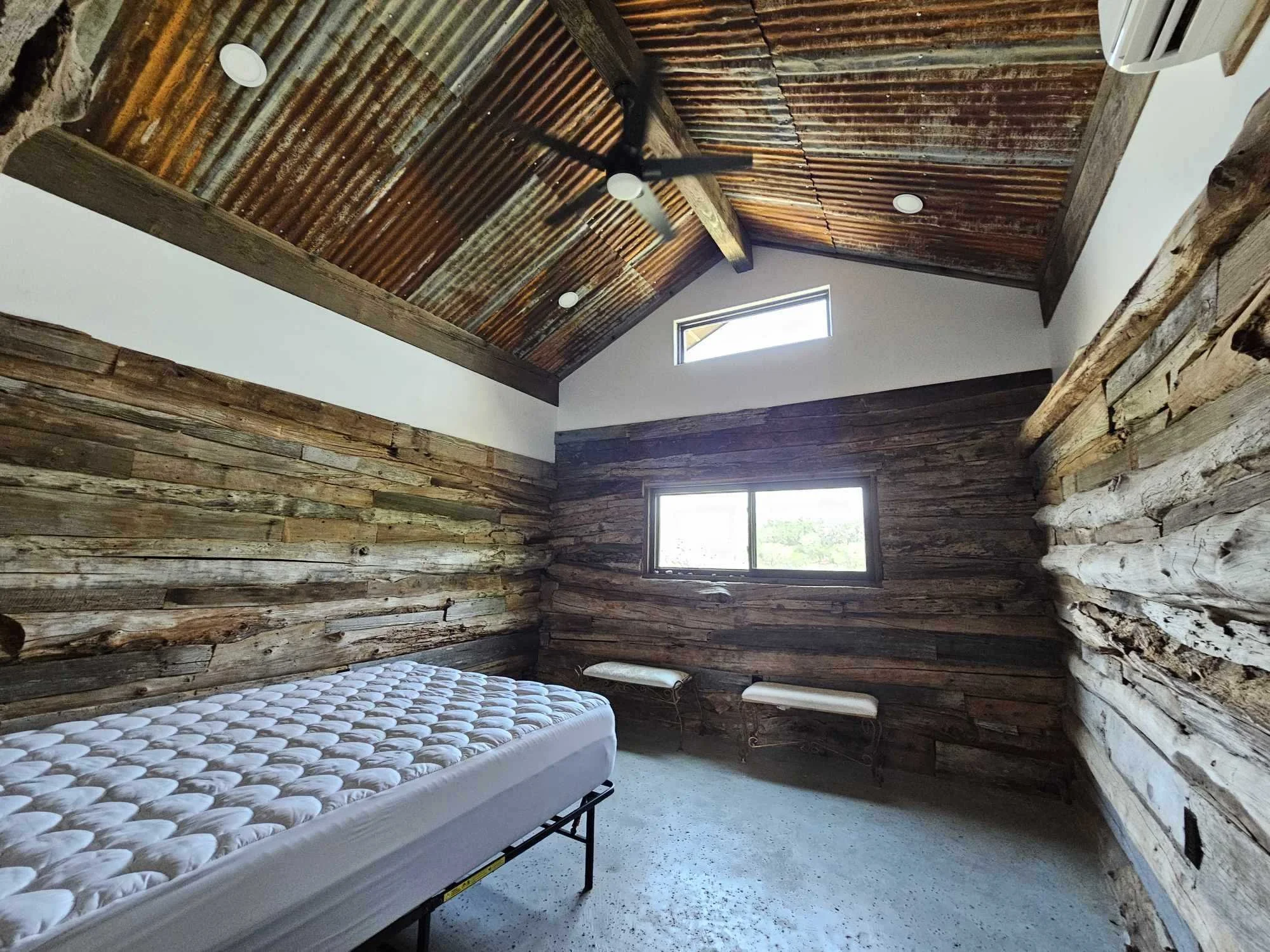 rebuilt log home integrated to new bedroom