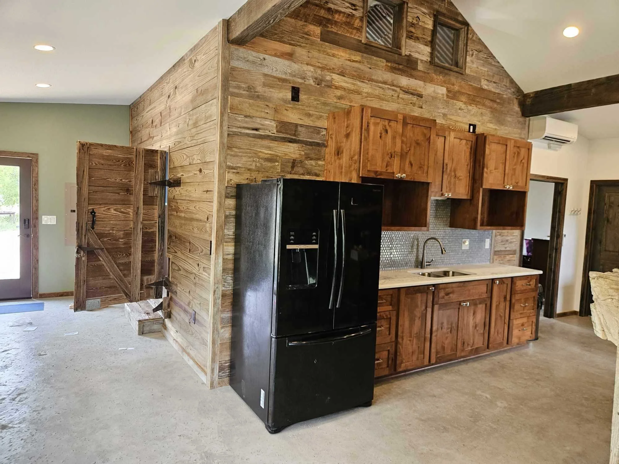 rebuilt corn crib integrated to new space