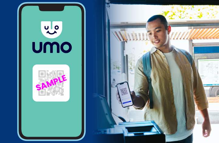 A young man with a backpack using his phone at a transportation kiosk, with a large screen displaying a QR code and the UMO app logo, indicating he is paying or checking in for transit.