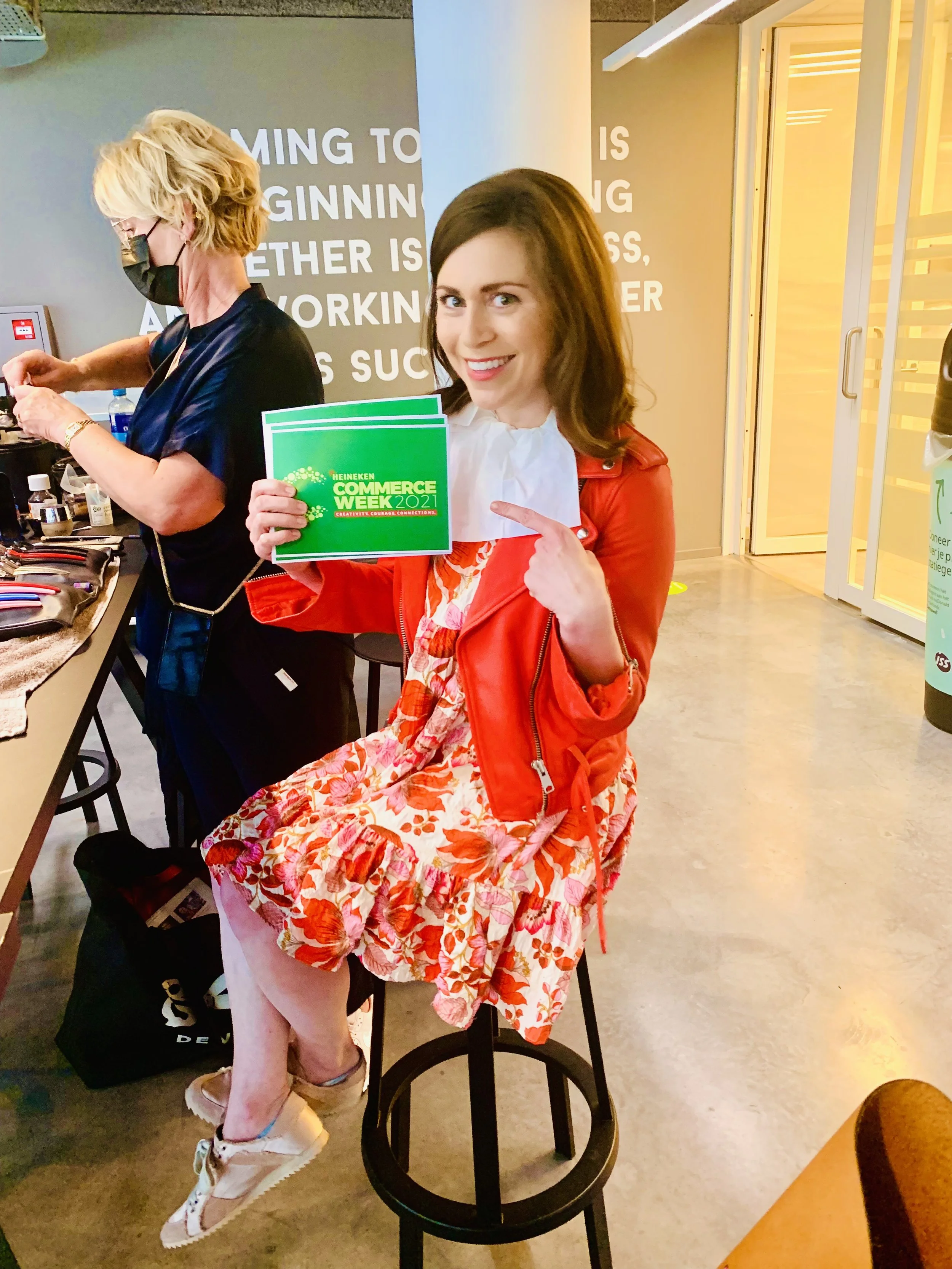 Stacey Tank getting ready to speak at "Heineken Commerce Week 2021" while smiling at the camera in Amsterdam, the Netherlands.