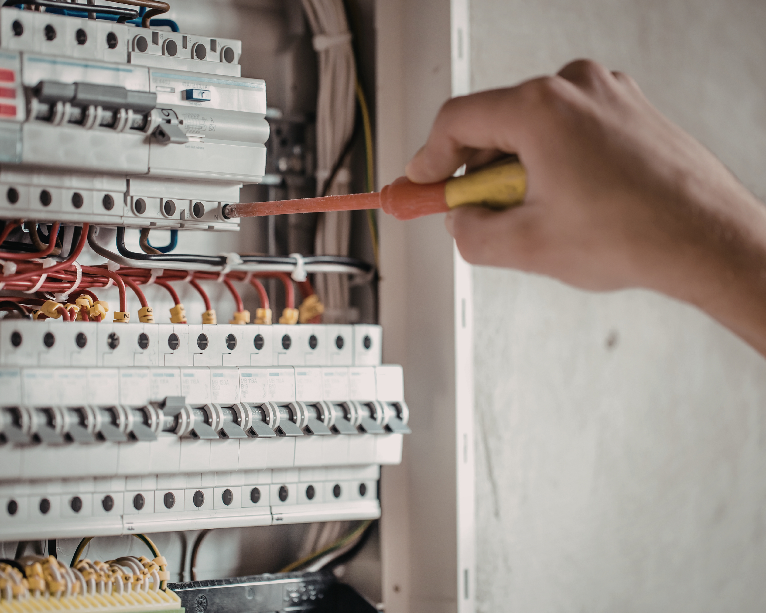 Electrician working on wires.