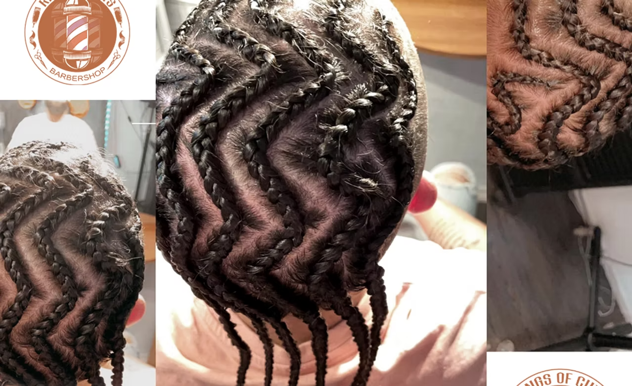 A person with freshly braided hair, showcasing neat, zigzag-shaped cornrows. The image focuses on the back of the head, displaying intricate braiding patterns.