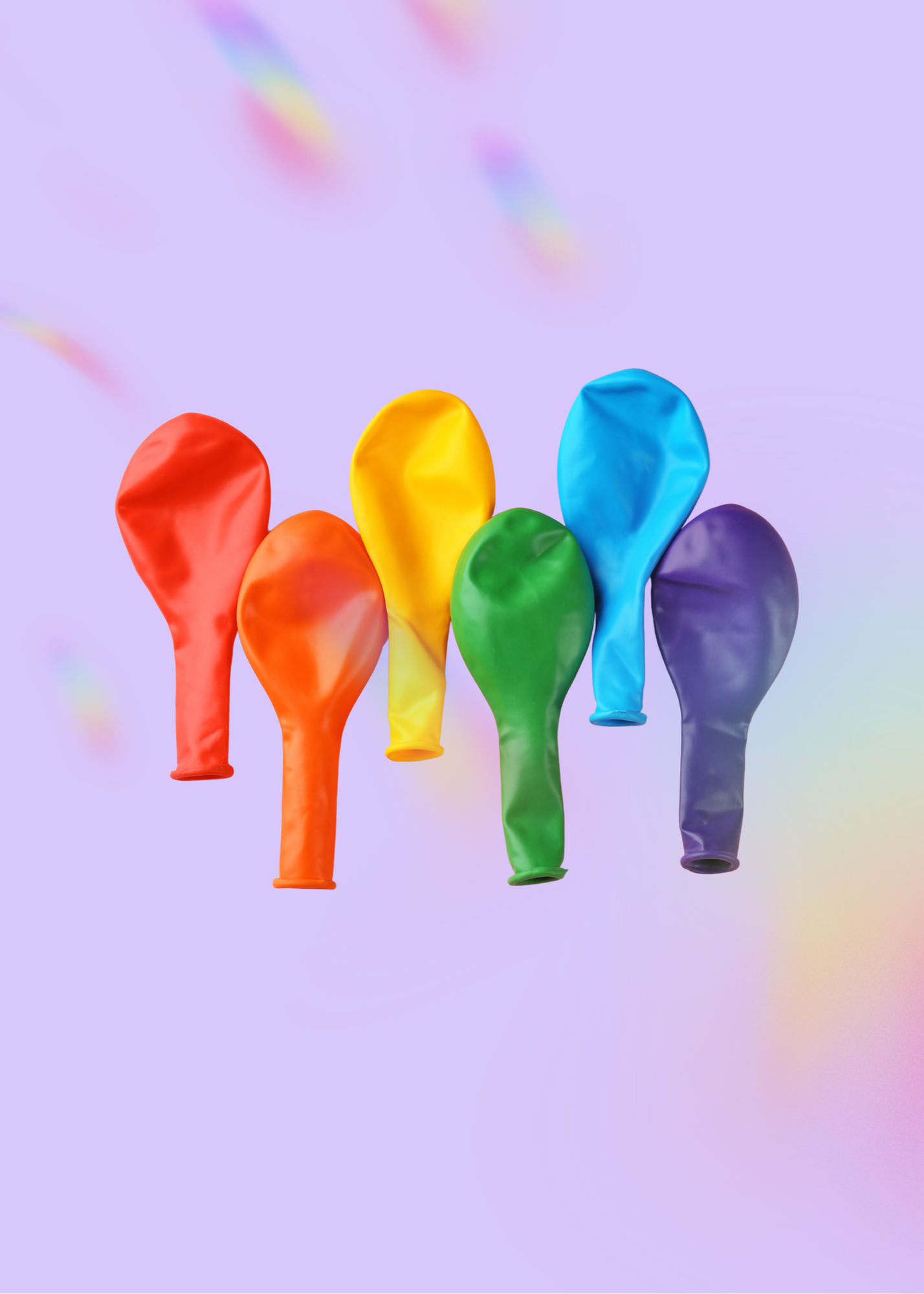 Colorful inflated balloons in red, orange, yellow, green, blue, purple on a pastel purple background.