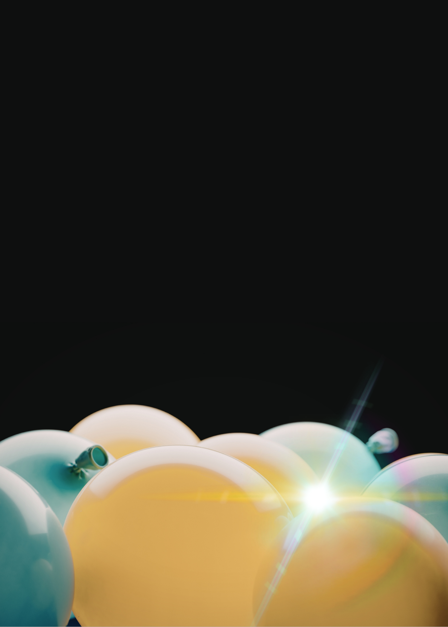 Colorful balloons with a glowing light and lens flare effects, against a black background.