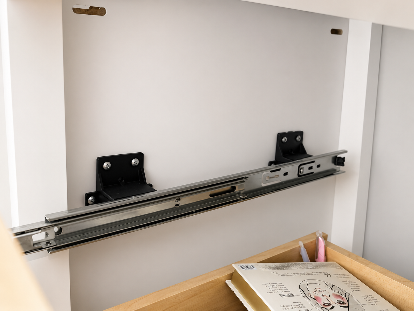 Universal rear mount drawer glide adapter block compatible with legacy Merillat, KraftMaid, and Cardell cabinet lines.