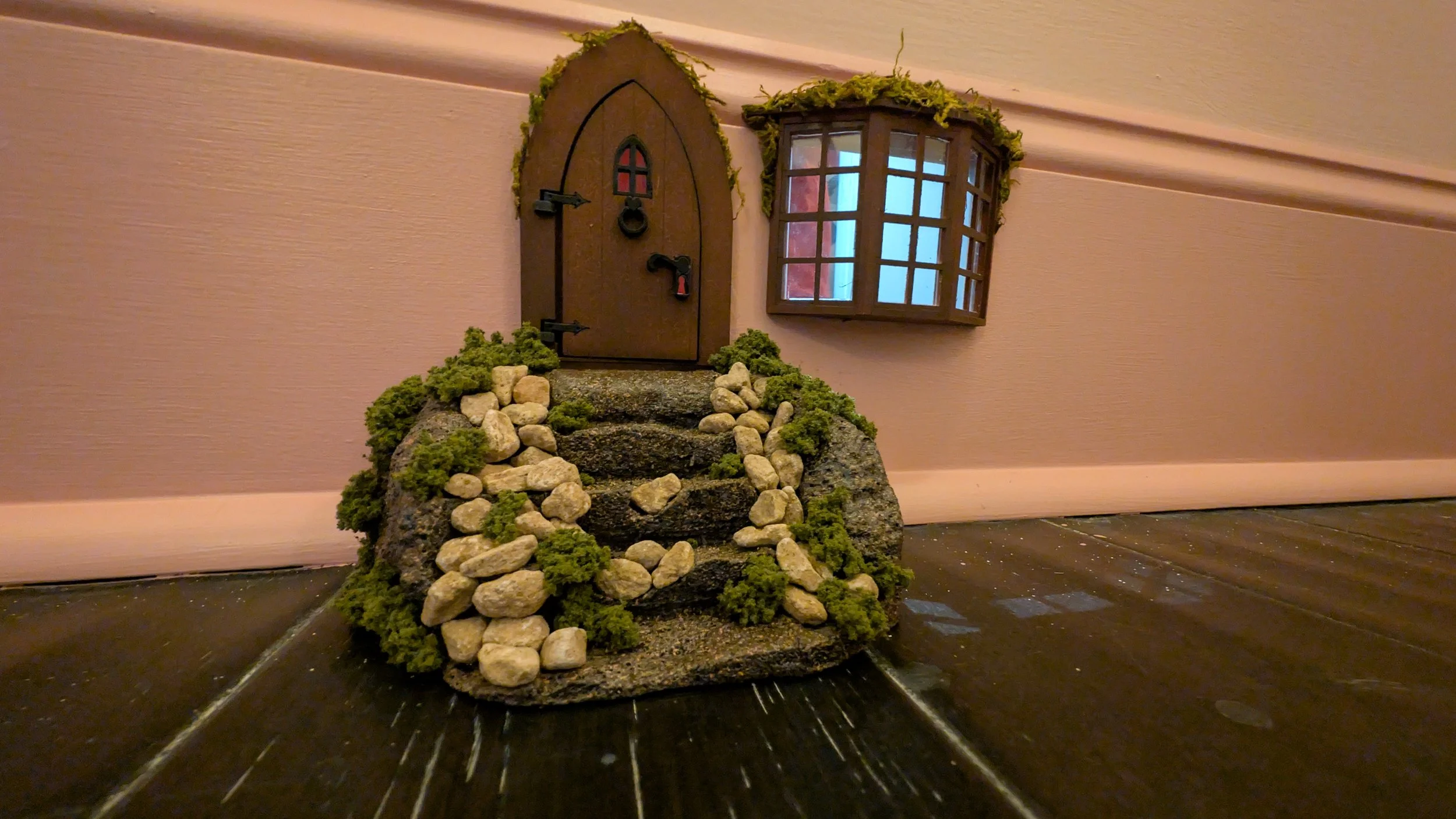 mouse house in baseboard