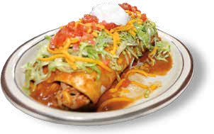 Corner beef enchilada topped with lettuce, cheese, tomato, sour cream, and sauce on a white plate.